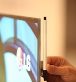 OLED телевизор LG тоньше ручки